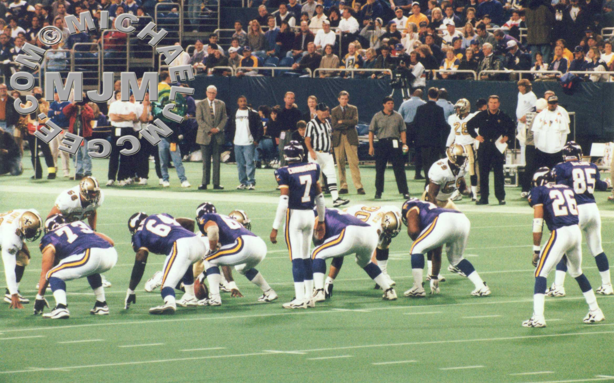Ditka looks on