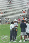 Defensive Coordinator Tony Dungy (C)